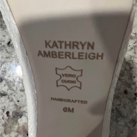 Kathryn Amberleigh Snakeskin Embossed White Pumps
Size 6 - Picture 5 of 6